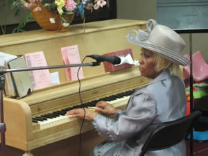 Piano Player at Sunday Worship